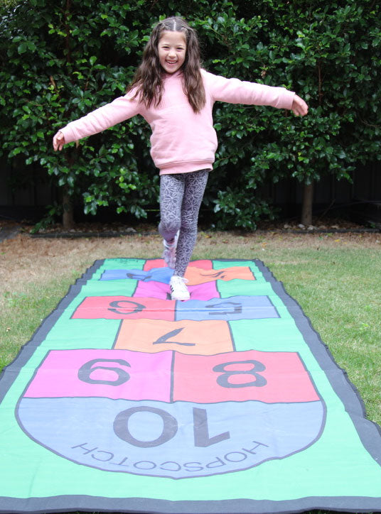 Colourful 3m Long Hopscotch Mat With Petal Pegs Kids Lawn Game - Lifestyle Image 1