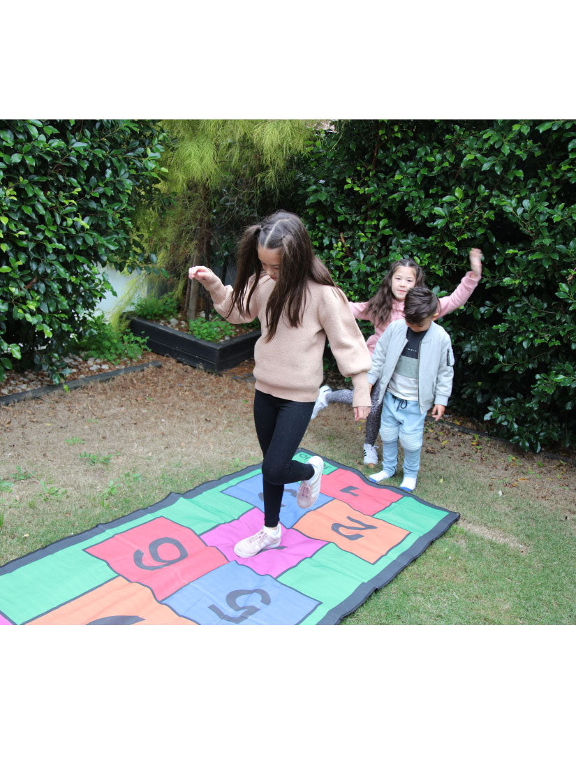 Colourful 3m Long Hopscotch Mat With Petal Pegs Kids Lawn Game - Lifestyle Image 4