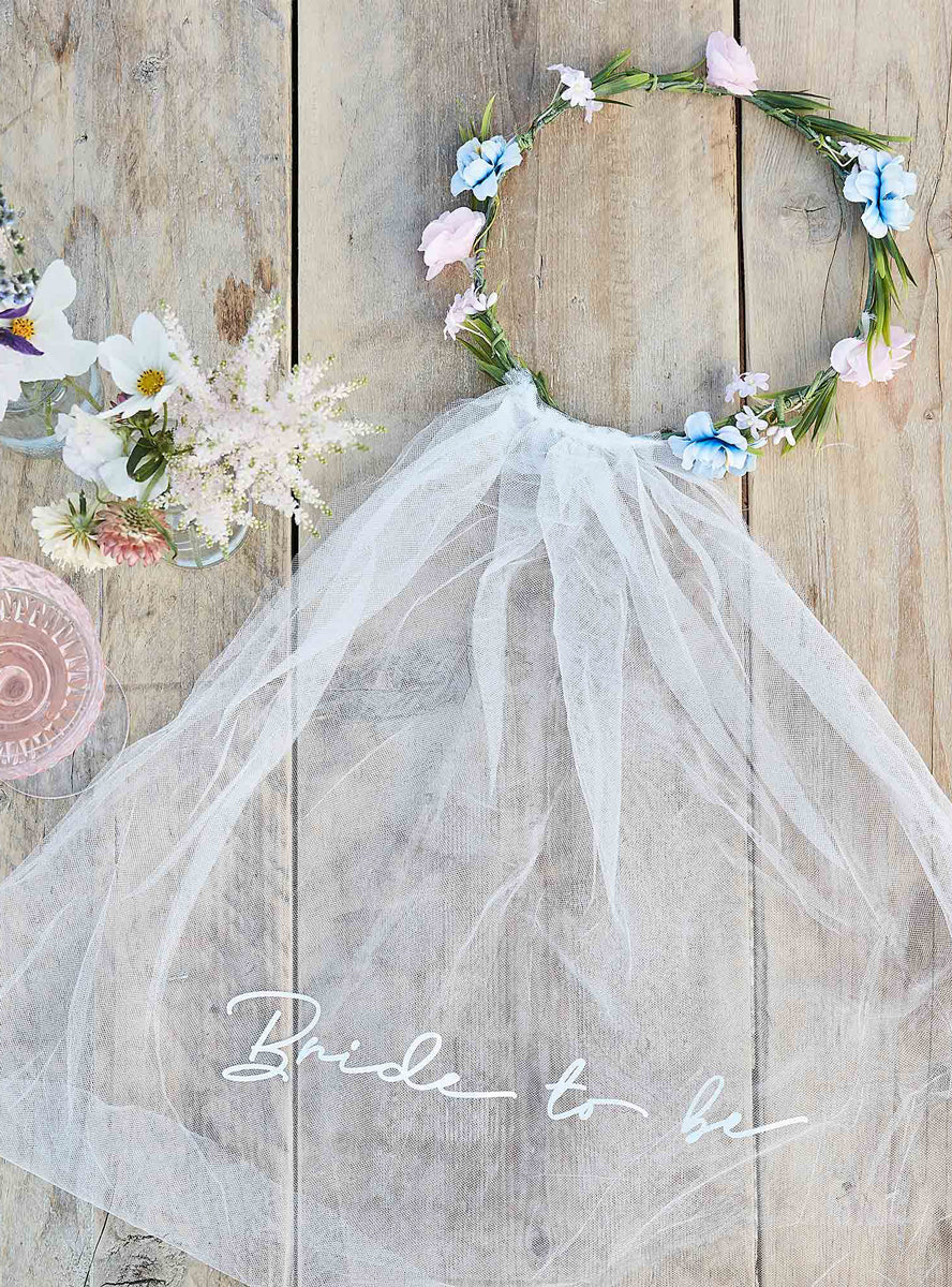 white bride flower crown with veil - lifestyle image