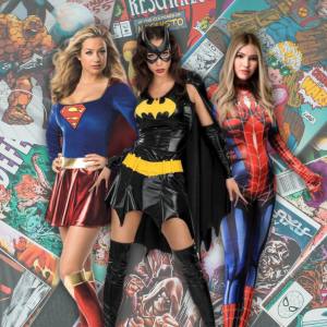 Image of women in superhero costumes