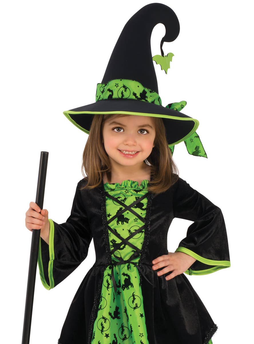 Girl's Green Witch Halloween Fancy Dress Costume Close Up Image