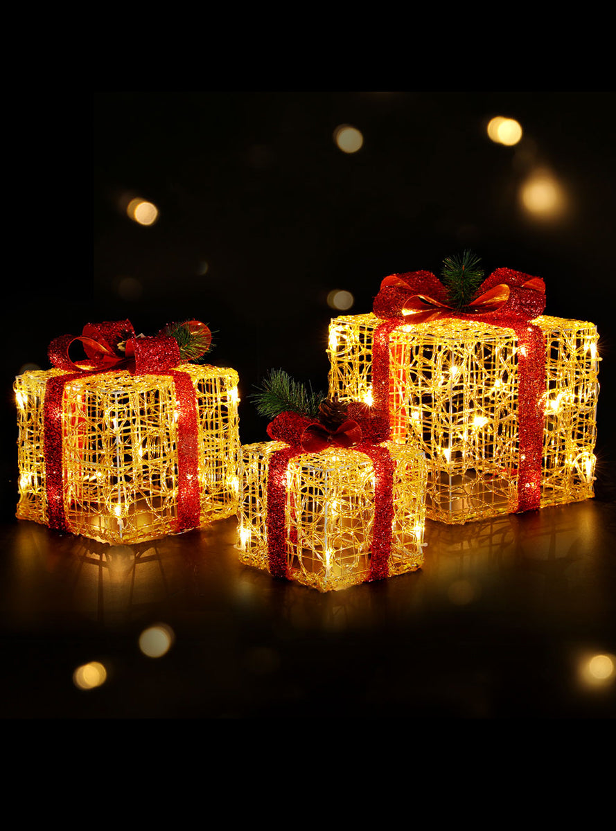 Light Up Jingle Jollys 3 Piece Red Bow Gold Gift Box Christmas Decorations - Lifestyle Image
