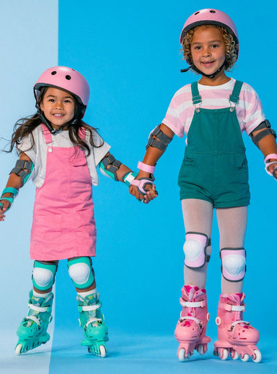 Pink Twista Kids Roller Skates - Lifestyle Image 1
