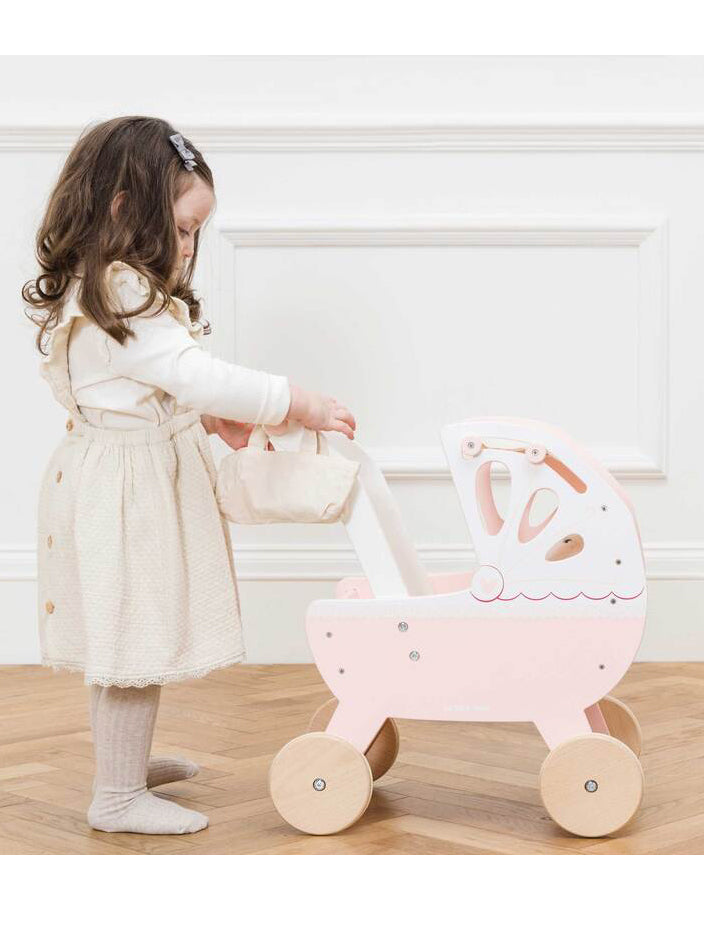 Wooden Pink And White Kids Doll Pram - Lifestyle Image 4