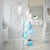 Image of a single balloon with blue and silver tassels and string decorating the base of the balloon.