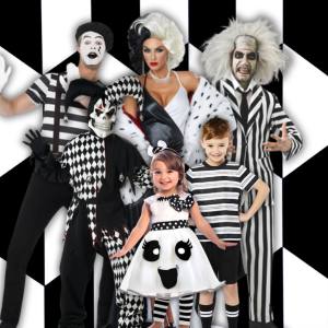 Image of 3 adults and 3 kids wearing black and white costumes, there is a mime, Cruella De Vil, Beetlejuice, a Jester, Pugsley Addams and a ghost.