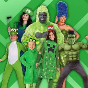 Image of 3 adults and 4 kids wearing different green coloured costumes, included characters are Luigi, a green Gorilla, Marge Simpson, Yoshi, an Alien, a Minecraft Creeper and The Hulk.