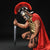 Image of a Roman Gladiator holding a novelty sword, wearing a gold chest plate.