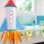 Image of a space themed party set up with space and alien party supplies.