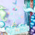 Image of an Under the Sea birthday party, with balloons, garland and table setting.