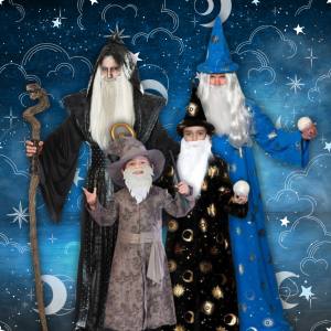 Image of 4 people dressed in Wizard costumes.