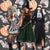 Image of 3 women dressed in Halloween costumes, one is Beetlejuice, one a witch and one a possessed nun.