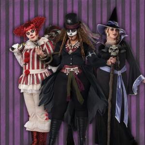 Image of 3 women wearing plus size Halloween costumes, one a clown, one a witch and one a voodoo doctor.