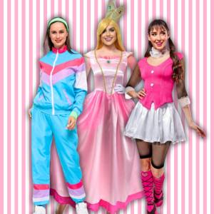 Image of 3 women dressed in costume, one a 1980s Tracksuit, one Princess Peach and the other Draculaura from Monster High.