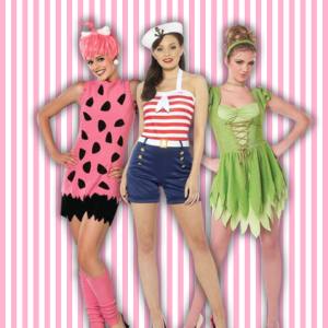 Image of 3 women dressed in costumes with a pink and white striped background, one is Pebbles Flintstone, one Tinkerbell and the other a sailor.