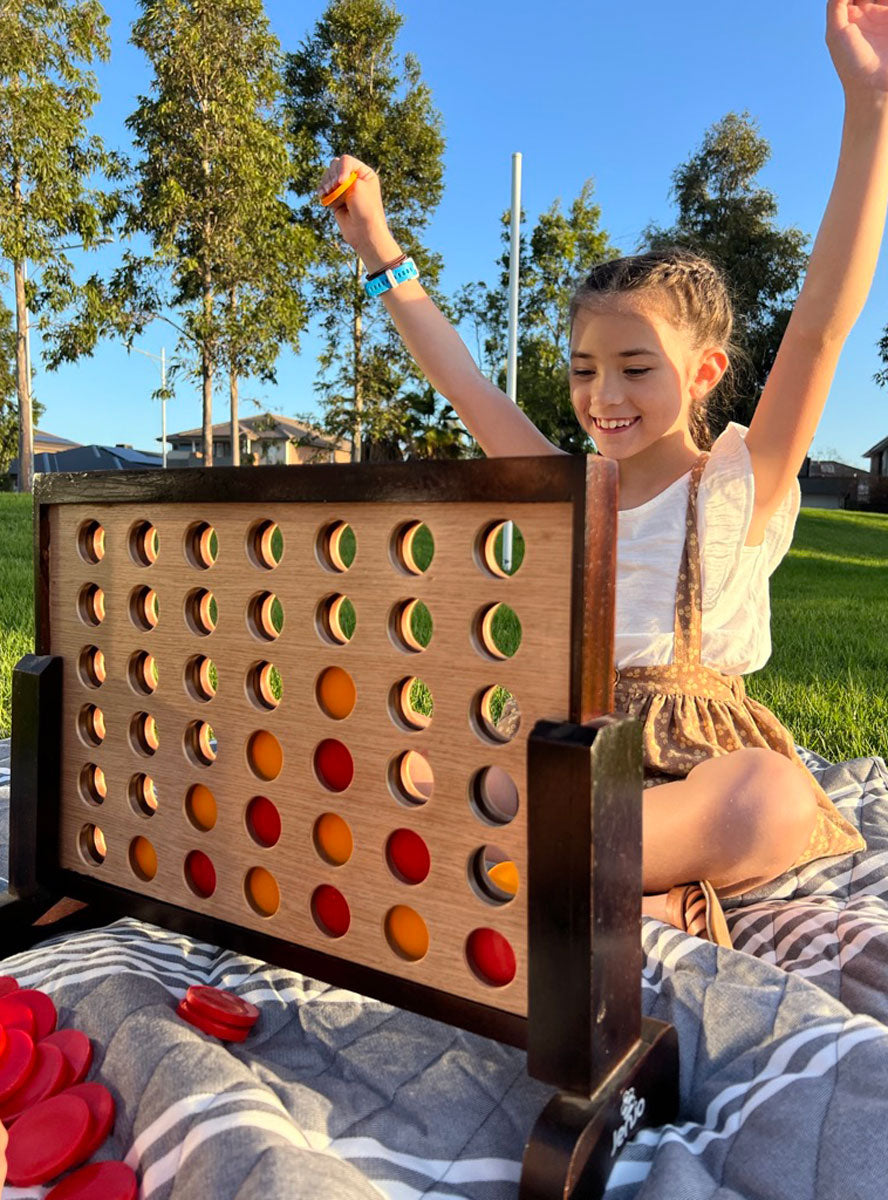 4 In A Row 52cm Hardwood Indoor Game - Lifestyle Image 2
