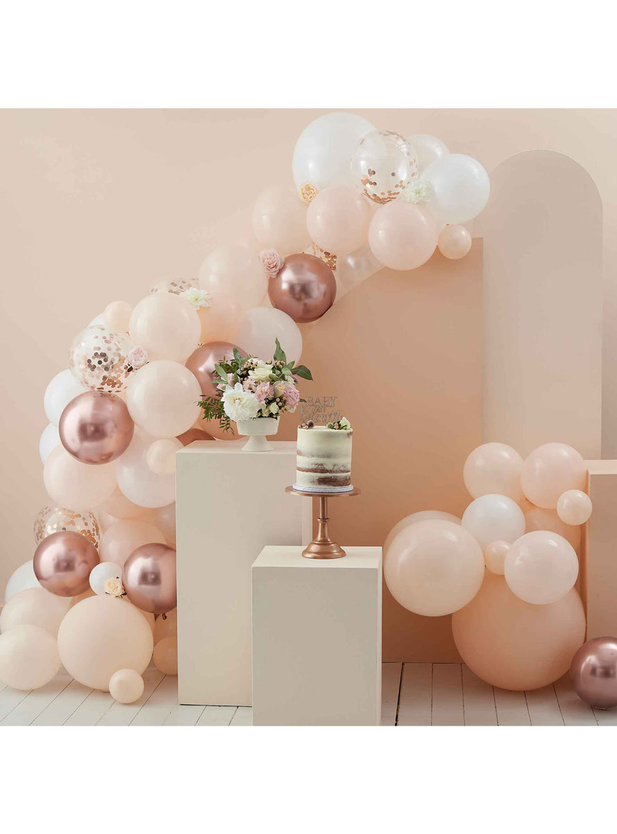 Baby In Bloom Peach And Rose Gold Balloon Arch With Confetti Balloons - Lifestyle Image