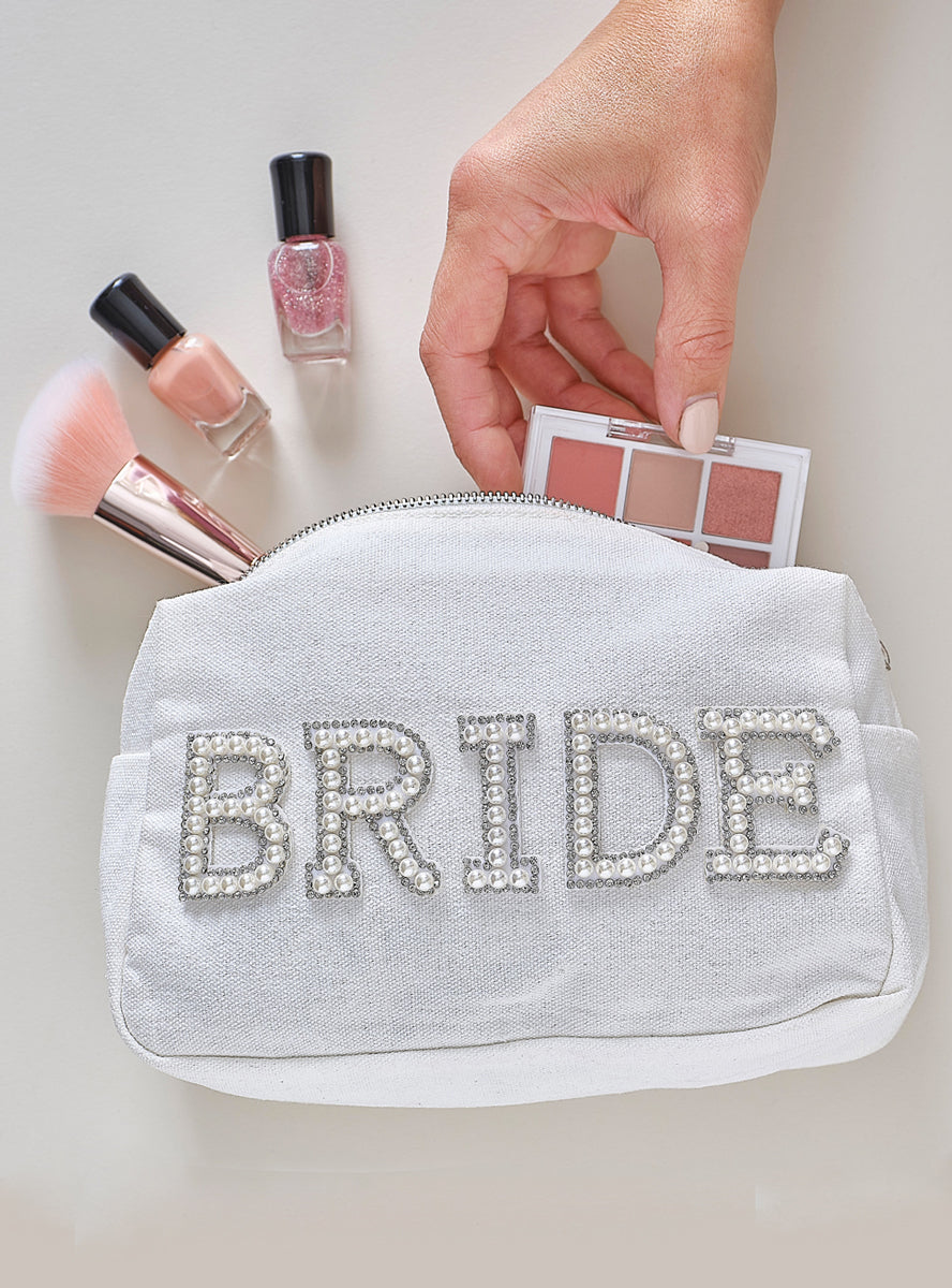 white bride makeup bag with pearls - lifestyle image