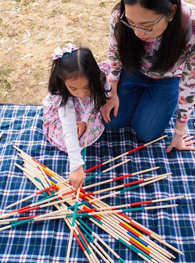 Giant Pick Up Sticks 90cm Party Game - Lifestyle Image 1