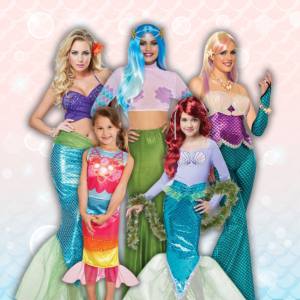 Image of women and girls in mermaid costumes