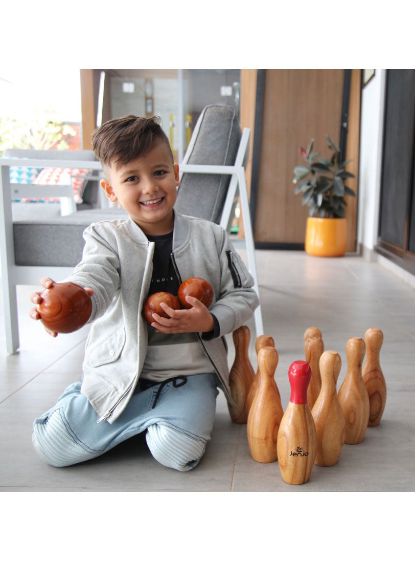 Wooden Skittles Outdoor Bowling Ball Game - Lifestyle Image 1