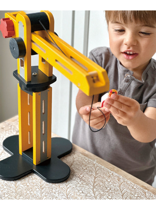 Big Wooden Yellow Crane Toy - Lifestyle Image 3
