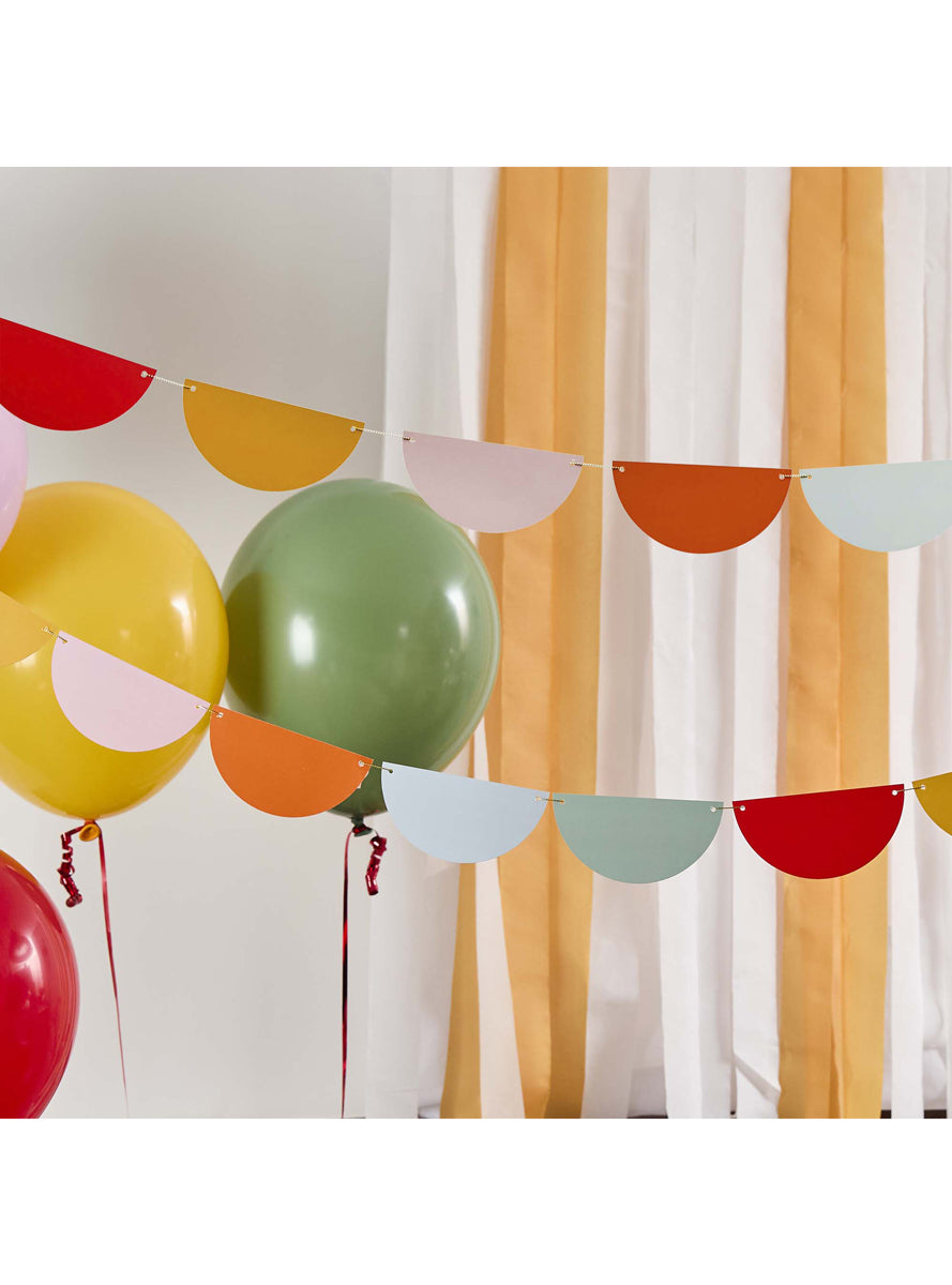 Circus Party 4m Long Rainbow Scalloped Card Garland — Lifestyle Image