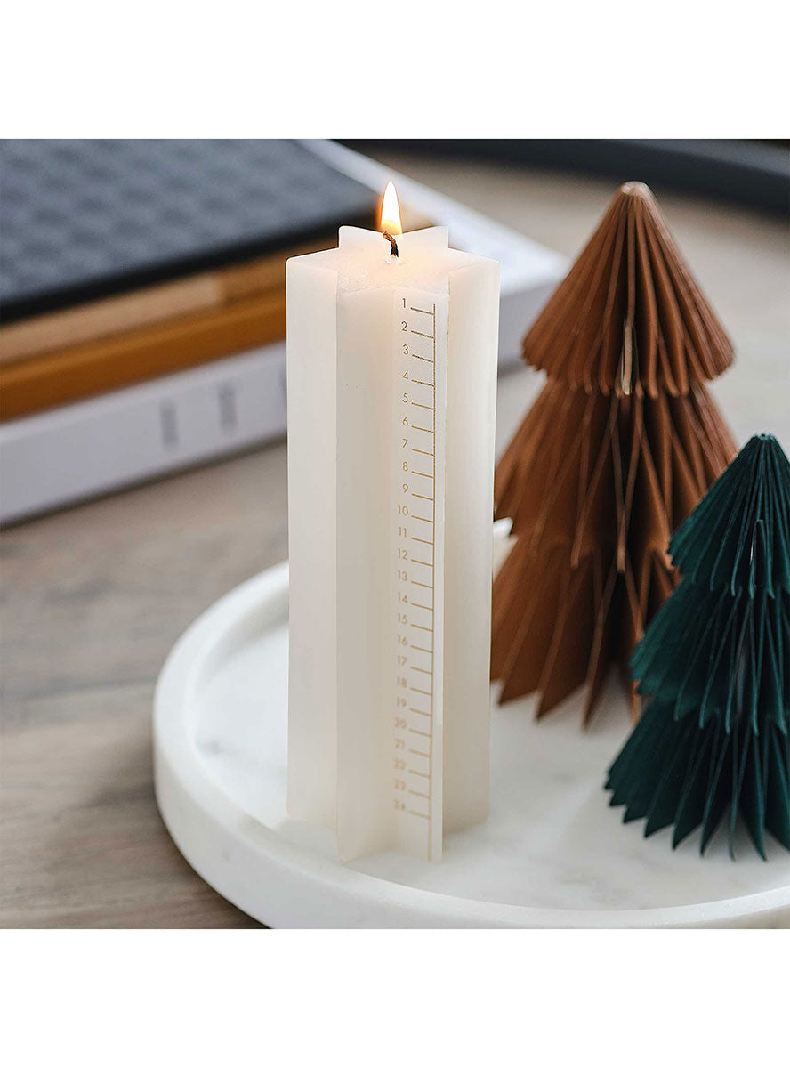 Copper Star Shaped Cosy Advent Calendar Candle – Lifestyle Image