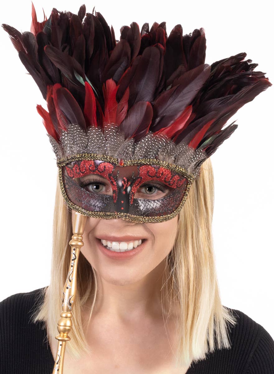 Hand Held Red and Gold Half Face Masquerade Mask with Feathers - Main Image