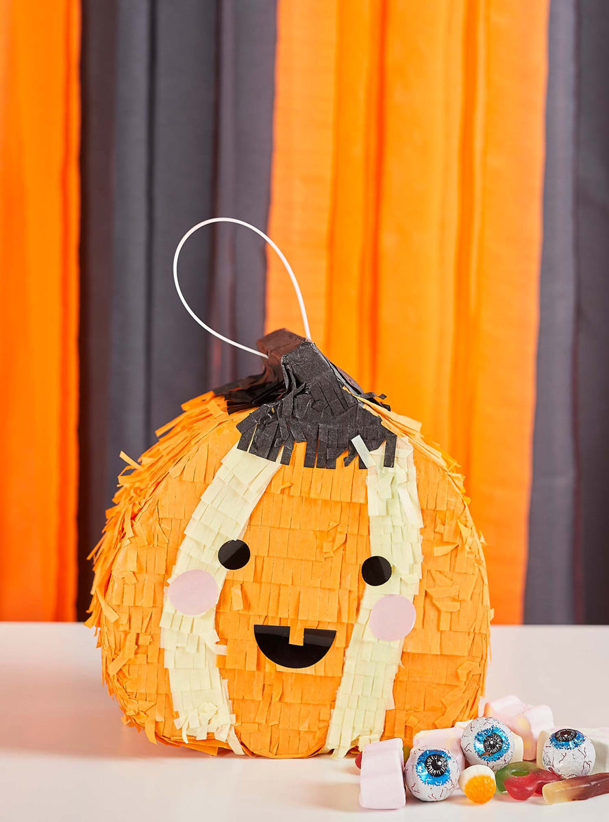Happy Halloween 20cm Orange Pumpkin Pinata with Face Stickers - Lifestyle Image 2