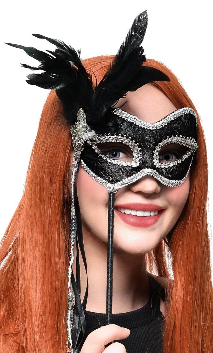 Feathered Black and Silver Hand Held Masquerade Mask - Main Image