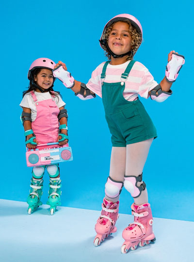 Pink Twista Kids Roller Skates - Lifestyle Image 2