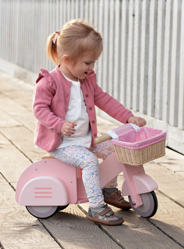 Pink Wooden Toy Scooter For Children - Lifestyle Image 1