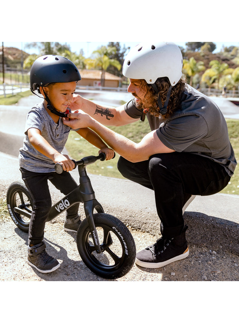 Velo Pro Lightweight Black Balance Bike For Children - Lifestyle Image 1