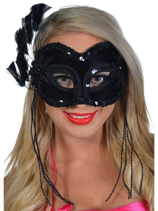 Black Sequin Masquerade Mask With Feather Fan Appliqué and Side Tassels - View 1